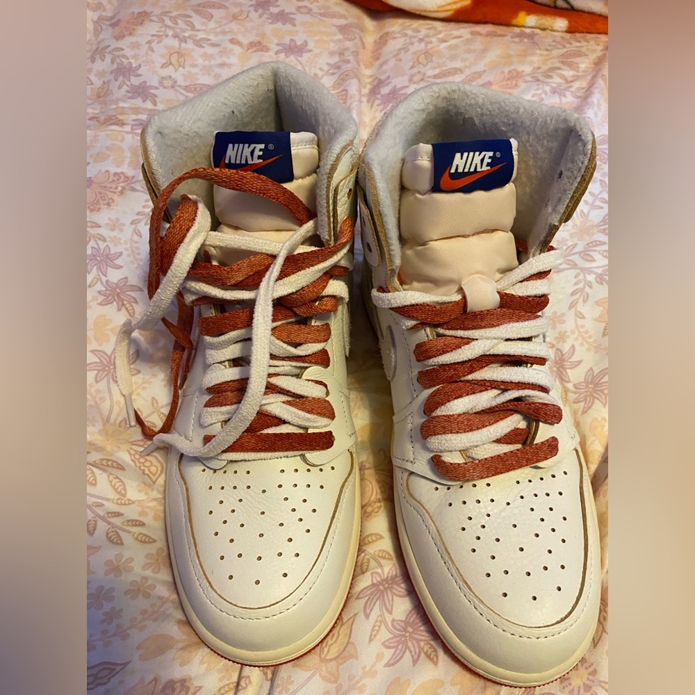 Nike Jordan’s Red and White Athletic Shoes